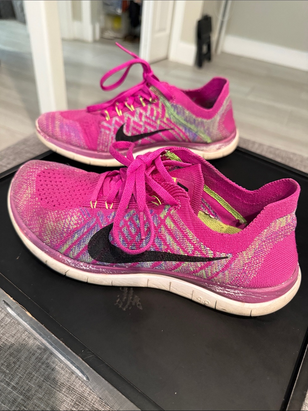 Nike Pink Knit Flyknit Running Sneakers with Black Swoosh